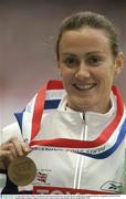 31 August 2003; Hayley Tullett, Great Britain, with the Bronze medal she won in the Women's 1500m Final during the ninth day's competition at the 9th IAAF World Championships in Athletics at the Stade de France, Paris, France. Picture credit; Brendan Moran / SPORTSFILE