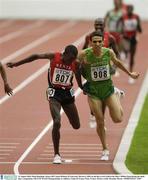 31 August 2003; Eliud Kipchoge, Kenya (807) beats Hicham El Guerrouj, Morocco, (908) on the line to win Gold in the Men's 5000m Final during the ninth day's competition at the 9th IAAF World Championships in Athletics at the Stade de France, Paris, France. Picture credit; Brendan Moran / SPORTSFILE