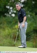 3 September 2003; Paul McGinley of The K Club after holing out a putt during the Pro Am Smurfit PGA Irish Championship at Adare Manor Hotel & Golf Resort, Co. Limerick. Picture credit; Kieran Clancy / SPORTSFILE