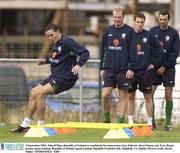 3 September 2003; John O'Shea, Republic of Ireland, is watched by his team-mates Gary Doherty, Steve Finnan and  Gary Breen during squad training. Republic of Ireland squad training, Malahide Football Club, Malahide, Co. Dublin. Picture credit; David Maher / SPORTSFILE