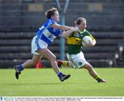 30 August 2003; Deirdre Corridan, Kerry, in action against Margaret Phelan Mulhall, Laois during the TG4 Ladies All-Ireland Senior Football Championship Quarter-Final between Laois and Kerry at Cusack Park, Ennis, Co Clare. Picture credit;  Kieran Clancy / SPORTSFILE
