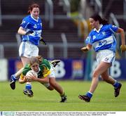 30 August 2003; Sarah O'Connor, Kerry, in action against Martha Kirwan and Linda Brennan, Laois during the TG4 Ladies All-Ireland Senior Football Championship Quarter-Final between Laois and Kerry at Cusack Park, Ennis, Co Clare. Picture credit;  Kieran Clancy / SPORTSFILE