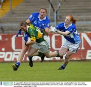 30 August 2003; Deirdre Corridan, Kerry, in action against Patricia Fogarty and Anna Connolly, Laois during the TG4 Ladies All-Ireland Senior Football Championship Quarter-Final between Laois and Kerry at Cusack Park, Ennis, Co Clare. Picture credit;  Kieran Clancy / SPORTSFILE