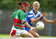 30 August 2003; Michelle McGing, Mayo, in action against Mary O'Donnell during the TG4 Ladies All-Ireland Senior Football Championship Quarter-Final between Mayo and Waterford at Cusack Park, Ennis, Co Clare. Picture credit;  Kieran Clancy / SPORTSFILE