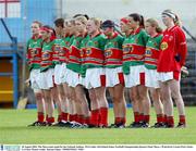 30 August 2003; The Mayo team stand for the National Anthem before the TG4 Ladies All-Ireland Senior Football Championship Quarter-Final between Mayo and Waterford at Cusack Park, Ennis, Co Clare. Picture credit; Kieran Clancy / SPORTSFILE