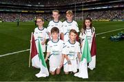 19 August 2018; Galway flagbearers, from left, Cillian McSweeney, Jude McGarry, Tom Hynes and Tara Kelly with Limerick's William Ryan and John Ross pictured in Croke Park welcoming the Limerick and Galway hurlers to the field for their All-Ireland Final meeting with Limerick. Bord Gáis Energy offers its customers unmissable rewards throughout the Championship season, including match tickets and hospitality, access to training camps with Hurling stars and the opportunity to present Man of the Match Awards at U-21 games. Photo by Stephen McCarthy/Sportsfile