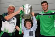 20 August 2018; Jake Cloke, age 10, from Davidstown, Co Wexford, lifts the Liam MacCarthy Cup alongside manager John Kiely and captain Declan Hannon during the All-Ireland Senior Hurling Championship winners visit to Our Lady's Children's Hospital Crumlin, Dublin. Photo by Piaras Ó Mídheach/Sportsfile