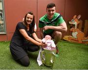 20 August 2018; Team captain Declan Hannon with Sally Flanagan, and her daughter, Sadie O'Brien, age 20 days, from Youghal, Cork, in the Liam MacCarthy Cup during the All-Ireland Senior Hurling Championship winners visit to Our Lady's Children's Hospital Crumlin, Dublin. Photo by Piaras Ó Mídheach/Sportsfile