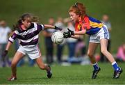 19 August 2018; Katie O'Meara of St Patricks, Co. Cavan, in action against Eleanor Keating of Skibereen, Co. Cork, both competing in the Gaelic Football Girls U12 event during day two of the Aldi Community Games August Festival at the University of Limerick in Limerick. Photo by Harry Murphy/Sportsfile