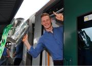 20 August 2018; William O'Donoghue with the Liam MacCarthy Cup as the Limerick squad depart from Heuston Train Station, Dublin. Photo by Piaras Ó Mídheach/Sportsfile