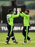 20 August 2018; Gary Wilson, left, and Simi Singh of Ireland celebrate after claiming the wicket Hazratullah Zazai of Afghanistan during the T20 International cricket match between Ireland and Afghanistan at Bready Cricket Club, in Magheramason, Co. Tyrone. Photo by Seb Daly/Sportsfile