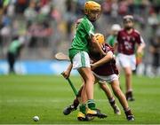 19 August 2018; Conn Mernagh, Murrintown NS, Murrintown, Co Wexford, representing Galway, in action against Canice Murphy, Annyalla NS, Castleblayney, Co Monaghan, representing Limerick, during the INTO Cumann na mBunscol GAA Respect Exhibition Go Games at the GAA Hurling All-Ireland Senior Championship Final match between Galway and Limerick at Croke Park in Dublin. Photo by Piaras Ó Mídheach/Sportsfile