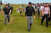 6 July 2018; Rory McIlroy of Northern Ireland, centre, accompanied by personal security, during Day Two of the Dubai Duty Free Irish Open Golf Championship at Ballyliffin Golf Club in Ballyliffin, Co. Donegal. Photo by Oliver McVeigh/Sportsfile