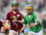 19 August 2018; Eoghan Durkan, Corballa NS, Corballa, Co Sligo, representing Limerick, in action against Seosamh Ó Loinsigh, Gaelscoil Bharra, Cabrach, Co Dublin, representing Galway, during the INTO Cumann na mBunscol GAA Respect Exhibition Go Games at the GAA Hurling All-Ireland Senior Championship Final match between Galway and Limerick at Croke Park in Dublin. Photo by Seb Daly/Sportsfile