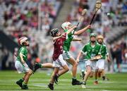19 August 2018; Jake Henley, Scoil Mhuire, Tallow, Co Waterford, representing Limerick, in action against Ciarán Logan, St Colmcille’s PS, Ballymena, Co Antrim, representing Galway, during the INTO Cumann na mBunscol GAA Respect Exhibition Go Games at the GAA Hurling All-Ireland Senior Championship Final match between Galway and Limerick at Croke Park in Dublin. Photo by Seb Daly/Sportsfile