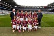 19 August 2018; Mini-games co-ordinator Gerry O'Meara, with the Galway team, back row, left to right, Muireann Ní Riocaird, St Fiachra's SNS, Beaumont, Co Dublin, Ciara Connolly, Aughrim NS, Aughrim, Co Wicklow, Sarah May Walsh, Ballyfacey NS, Ballyfacey, Co Kilkenny, Jane Murray, Killeigh NS, Killeigh, Co Offaly, Katelyn Shore, Paddock NS, Mountrath, Co Laois, front row, left to right, Kate Ní Riain, Gaelscoil Eiscir Riada Leamhchán, Co Dublin, Lucy Devaney, Holy Rosary PS, Old Court, Firhouse, Co Dublin, Ciara Ryan, Mercy Convent NS, Naas, Co Kildare, Ellen Hawes, Stonepark NS, Stonepark, Co Longford, Caoimhe Kelly, Scoil Bhríde, Ballinasloe, Co Galway, ahead of the INTO Cumann na mBunscol GAA Respect Exhibition Go Games the GAA Hurling All-Ireland Senior Championship Final match between Galway and Limerick at Croke Park in Dublin. Photo by Daire Brennan/Sportsfile