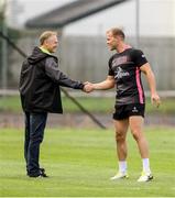 21 August 2018; Ireland Head Coach Joe Schmidt meets Ulster Rugby's new centre Will Addison during Ulster Rugby training at Pirrie Park, in Belfast. Photo by John Dickson/Sportsfile