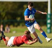 22 August 2018; Chris Cosgrave of Leinster is tackled by Billy Kingston of Munster during the U18 Schools Interprovincial match between Leinster and Munster at the University of Limerick in Limerick. Photo by Matt Browne/Sportsfile