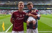 11 August 2018;  Dylan Joyce of Galway, with his 6 month old godson Liam Joyce, and Éanna McCormack, left, after the Electric Ireland GAA Football All-Ireland Minor Championship semi-final match between Galway and Meath at Croke Park in Dublin. Photo by Piaras Ó Mídheach/Sportsfile