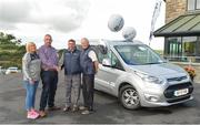 24 August 2018; KN Group's Vanessa Cunningham, All-Ireland GAA Golf Challenge organisers Liam Daniels and Nicholas Murphy presenting Michael O'Connell, father of Ian, with his specially-modified vehicle for his son Ian, who was paralysed from the neck down following a bicyle injury in Killarney in August 2017. This was during day one of the 20th annual KN Group All-Ireland GAA Golf Club Challenge at Concra Wood Golf Club, in Castleblayney, Co. Monaghan. Photo by Oliver McVeigh/Sportsfile