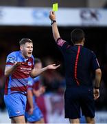 24 August 2018; Kevin Farragher of Drogheda United receives a yellow card from referee Robert Harvey during the Irish Daily Mail FAI Cup Second Round match between Drogheda United and Waterford at United Park in Drogheda, Louth. Photo by Stephen McCarthy/Sportsfile