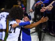 24 August 2018; A young Waterford supporter celebrates with Bastien Héry following the Irish Daily Mail FAI Cup Second Round match between Drogheda United and Waterford at United Park in Drogheda, Louth. Photo by Stephen McCarthy/Sportsfile