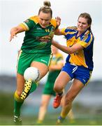 25 August 2018; Vikki Wall of Meath in action against Honor Ennis of Roscommon during the TG4 All-Ireland Ladies Football Intermediate Championship Semi-Final match between Meath and Roscommon at Dr Hyde Park in Roscommon. Photo by Eóin Noonan/Sportsfile