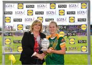 25 August 2018; Stacey Grimes of Meath is presented with her player of the match award by President of LGFA Máire Hickey during the TG4 All-Ireland Ladies Football Intermediate Championship Semi-Final match between Meath and Roscommon at Dr Hyde Park in Roscommon. Photo by Eóin Noonan/Sportsfile