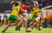25 August 2018; Hannah Looney of Cork in action against Olive McCafferty of Donegal during the TG4 All-Ireland Ladies Football Senior Championship Semi-Final match between Cork and Donegal at Dr Hyde Park in Roscommon. Photo by Piaras Ó Mídheach/Sportsfile