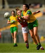25 August 2018; Nicole McLaughlin of Donegal is tackled by Orlagh Farmer of Cork during the TG4 All-Ireland Ladies Football Senior Championship Semi-Final match between Cork and Donegal at Dr Hyde Park in Roscommon. Photo by Eóin Noonan/Sportsfile