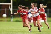 26 August 2018; Ceire Nolan of Louth in action against Aoife Laverty of Derry during the TG4 All-Ireland Junior Championship Semi Final match between Derry and Louth at Aghaloo O'Neills in Aughnacloy, Co. Tyrone. Photo by Oliver McVeigh/Sportsfile