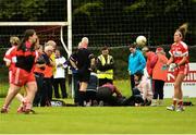 26 August 2018; Michelle McMahon of Louth, right, being attended to for an injury near the end of the game, which an Ambulance had to be called for, during the TG4 All-Ireland Junior Championship Semi Final match between Derry and Louth at Aghaloo O'Neills in Aughnacloy, Co. Tyrone. Photo by Oliver McVeigh/Sportsfile