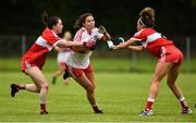 26 August 2018; Megan Devine of Derry in action against Michelle McMahon, left, and Sinead Woods of Louth during the TG4 All-Ireland Junior Championship Semi Final match between Derry and Louth at Aghaloo O'Neills in Aughnacloy, Co. Tyrone. Photo by Oliver McVeigh/Sportsfile