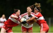 26 August 2018; Megan Devine of Derry in action against Michelle McMahon and Sinead Woods of Louth during the TG4 All-Ireland Junior Championship Semi Final match between Derry and Louth at Aghaloo O'Neills in Aughnacloy, Co. Tyrone. Photo by Oliver McVeigh/Sportsfile