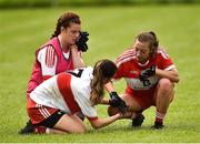 26 August 2018; A dejected Danielle Kivlehan of Derry is consoled by Shannen McLaughlin of Louth after the TG4 All-Ireland Junior Championship Semi Final match between Derry and Louth at Aghaloo O'Neills in Aughnacloy, Co. Tyrone. Photo by Oliver McVeigh/Sportsfile
