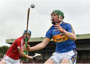 26 August 2018; Brian McGrath of Tipperary in action against Liam Healy of Cork during the Bord Gais Energy GAA Hurling All-Ireland U21 Championship Final match between Cork and Tipperary at the Gaelic Grounds in Limerick. Photo by Piaras Ó Mídheach/Sportsfile