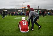 26 August 2018; Eoghan Murphy of Cork is consoled by a supporter after the Bord Gais Energy GAA Hurling All-Ireland U21 Championship Final match between Cork and Tipperary at the Gaelic Grounds in Limerick. Photo by Piaras Ó Mídheach/Sportsfile