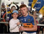 26 August 2018; Robert Byrne of Tipperary is presented with his Man of the Match award by Kate O’Connell, age 7, from Doneraile, Co Cork following the Bord Gais Energy GAA Hurling All-Ireland U21 Championship Final match between Cork and Tipperary at the Gaelic Grounds in Limerick. Photo by Sam Barnes/Sportsfile