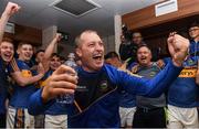 26 August 2018; Tipperary manager Liam Cahill celebrates on his arrival back into the winning dressing room after the Bord Gais Energy GAA Hurling All-Ireland U21 Championship Final match between Cork and Tipperary at the Gaelic Grounds in Limerick. Photo by Piaras Ó Mídheach/Sportsfile