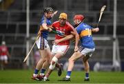 26 August 2018; Declan Dalton of Cork in action against Jerome Cahill, left, and Dillon Quirke of Tipperary during the Bord Gais Energy GAA Hurling All-Ireland U21 Championship Final match between Cork and Tipperary at the Gaelic Grounds in Limerick. Photo by Sam Barnes/Sportsfile