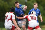 26 August 2018; Will Hickey of Leinster is tackled by Tom Stewart and Ben Carson of Ulster during the U18 Schools Interprovincial match between Leinster and Ulster at the University of Limerick in Limerick.  Photo by Matt Browne/Sportsfile