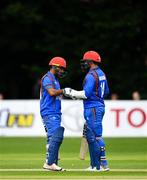 27 August 2018; Hashmatullah Shaidi, left, and Gulbadin Naib of Afghanistan congratulate each other after bringing up a century for their side during the One Day International match between Ireland and Afghanistan at Stormont Cricket Ground, Belfast, Co. Antrim. Photo by Seb Daly/Sportsfile