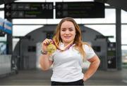 27 August 2018; Niamh McCarthy of Ireland with her Gold Medal from the Women’s F41 Discus event during the Team Ireland return from the 2018 World Para Athletics European Championships at Dublin Airport in Dublin. Photo by Piaras Ó Mídheach/Sportsfile