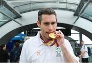 27 August 2018; Jason Smyth of Ireland with his Gold medals from the Men's T13 100m and 200m events as Team Ireland return from the 2018 World Para Athletics European Championships at Dublin Airport in Dublin. Photo by Sam Barnes/Sportsfile
