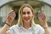 27 August 2018; Orla Comerford of Ireland with her Bronze medals from the Women's T13 100m and 200m events during the Team Ireland return from the 2018 World Para Athletics European Championships at Dublin Airport in Dublin. Photo by Piaras Ó Mídheach/Sportsfile