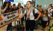 27 August 2018; Orla Comerford of Ireland with her Bronze medals from the Women's T13 100m and 200m events, followed by teammates Niamh McCarthy and Noelle Lenihan, as Team Ireland return from the 2018 World Para Athletics European Championships at Dublin Airport in Dublin. Photo by Sam Barnes/Sportsfile