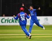 27 August 2018; Aftab Alam of Afghanistan celebrates after claiming the wicket of Paul Stirling of Ireland during the One Day International match between Ireland and Afghanistan at Stormont Cricket Ground, Belfast, Co. Antrim. Photo by Seb Daly/Sportsfile