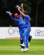 27 August 2018; Gulbadin Naib of Afghanistan celebrates with team-mate Shafiqullah Shafaq after claiming the wicket of William Porterfield of Ireland during the One Day International match between Ireland and Afghanistan at Stormont Cricket Ground, Belfast, Co. Antrim. Photo by Seb Daly/Sportsfile