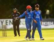 27 August 2018; Rashid Khan Arman of Afghanistan, right, is congratulated by team-mate Shafiqullah Shafaq after bowling out Gary Wilson of Ireland during the One Day International match between Ireland and Afghanistan at Stormont Cricket Ground, Belfast, Co. Antrim. Photo by Seb Daly/Sportsfile