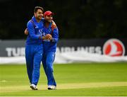 27 August 2018; Rashid Khan Arman, left, abd Hashmatullah Shaidi of Afghanistan congratulate each other following their side's victory during the One Day International match between Ireland and Afghanistan at Stormont Cricket Ground, Belfast, Co. Antrim. Photo by Seb Daly/Sportsfile